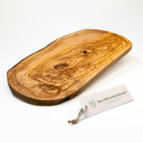 DAS OLIVENHOLZBRETT® Schneidebrett mit Saftrille/Servierbrett/Steakbrett/Olivenholzbrett mit Saftrille/Naturschnitt mit Griffeinkerbung links und rechts/ca. 40-44cm lang, 20-21cm breit