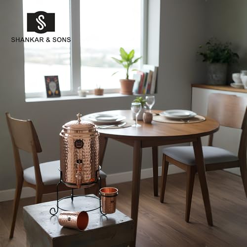 Image of SHANKAR & SONS 5 Litre Copper Water Dispenser Pot with Black Iron Stand and 2 Glasses | Hammered Texture, BPA Free, Non-Toxic with Added Health Benefits Traditional Matka for Drinking Water