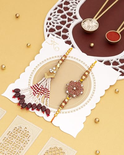 Image of House of Treats Bhaiya Bhabhi Rakhi Set With Kaju Katli 200g Rakhis for Bhaiya and Bhabhi Sweets Gift Pack Raksha Bandhan Gift Rakhi with Sweet