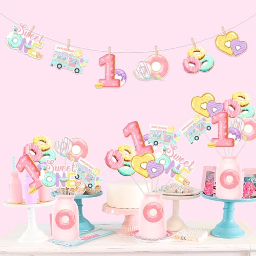 Fête Sweet One réussie avec 24 pics de table donut pour éviter une décoration banale