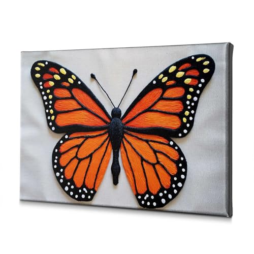 Tableau papillon monarque orange pour réveiller la décoration murale d'une salle de bain