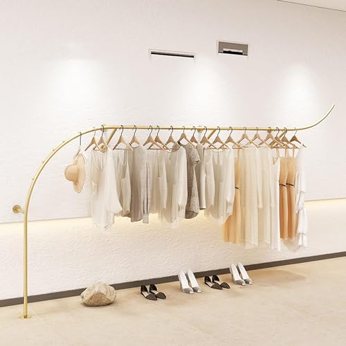 Portant à vêtements créatif haut de gamme pour l'aménagement de showrooms élégants