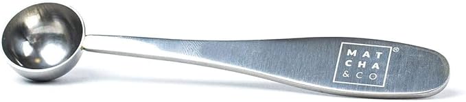 Cucharas medidoras de acero inoxidable unidas por una anilla.