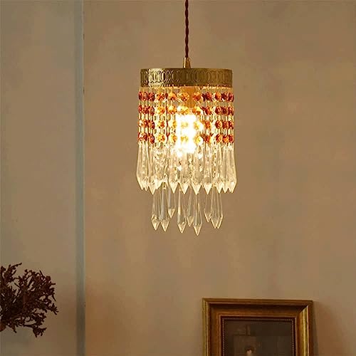 Lampe suspendue cristal E14 pour une ambiance de chevet chaleureuse