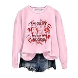 Détails effrayants : Manches longues ornées de squelettes dansants et d'étoiles mystérieuses ; Poches kangourou pratiques décorées de chats noirs pour ranger vos petits accessoires de sorcière