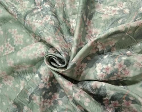 Tissu Dupion Dupe57 en soie vert irisé de 137 cm de large pour couture