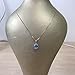Solid 14K gold handmade blue topaz and diamond halo necklace