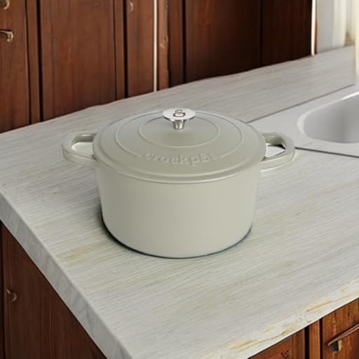 Image of Crock-Pot Artisan 7-Quart Round European Enameled Cast Iron Dutch Oven with Lid - Matte Green, Durable Oven Safe Cookware