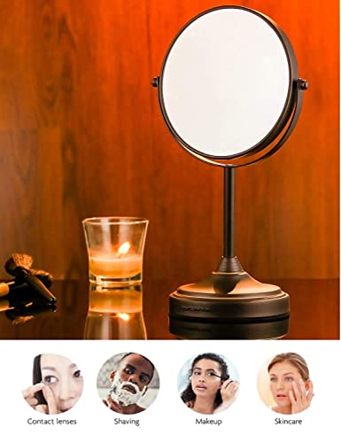 Image of OVENTE 7'' Tabletop Makeup Mirror with 1X /7X Magnification, 360 Swivel Design and Double-Sided Free-Standing Vanity Mirror Perfect for Dresser, Bedroom and Office Desk, Antique Bronze MNLCT70ABZ1X7X