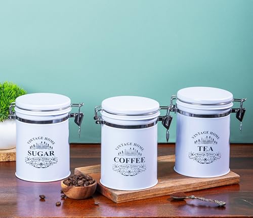 Metallure Home Clip-Lock Round Classic Airtight Container Set | Sugar Tea Coffee Container Set of 3 | Metal Containers for Kitchen Storage | Tea Coffee Sugar Containers | Food-Safe Jar Set (White) Metallure Home Clip-Lock Round Classic Airtight Container Set | Sugar Tea Coffee Container Set of 3 | Metal Containers for Kitchen Storage | Tea Coffee Sugar Containers | Food-Safe Jar Set (White)