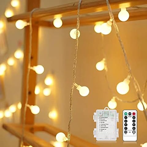 Christmas Warm White Fairy Lights, 33FT/10M 100led Blub Battery Fairy Lights with 8 Lighting Modes, Waterproof Globe String Lights with Remote & Timer for Christmas Tree, Wedding, Party Cover