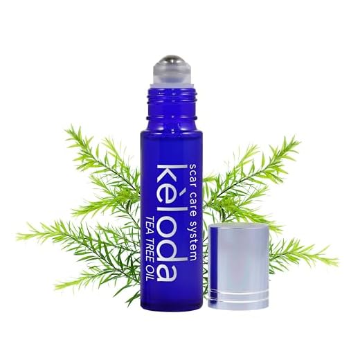 KELODA Scar & Keloid Removal Tea Tree Oil & Massager | For Treatment of Scars & Keloids after Surgery, Acne, Burns & Piercing | With Cocoa, Shea Butter, Vitamin E & Lavender Essential Oil 0.3 oz