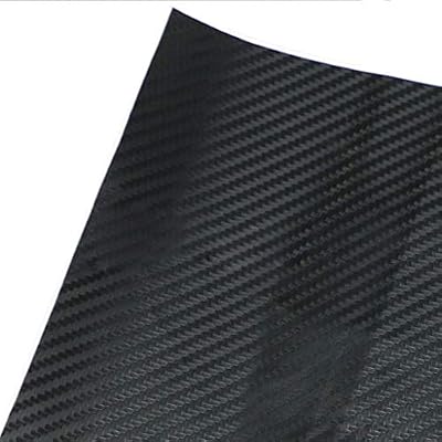 Close-up of a black 3D carbon fibre vinyl film showing its raised weave texture