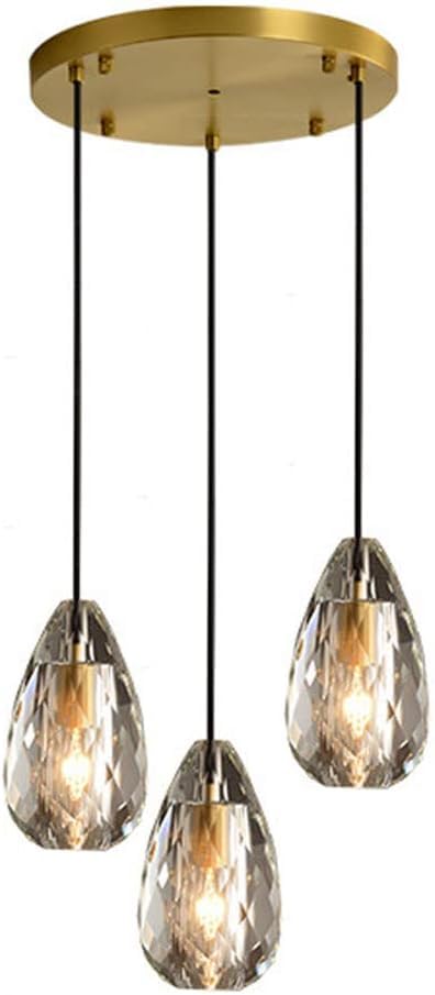 Suspension moderne en cristal et métal doré au design goutte d'eau épuré