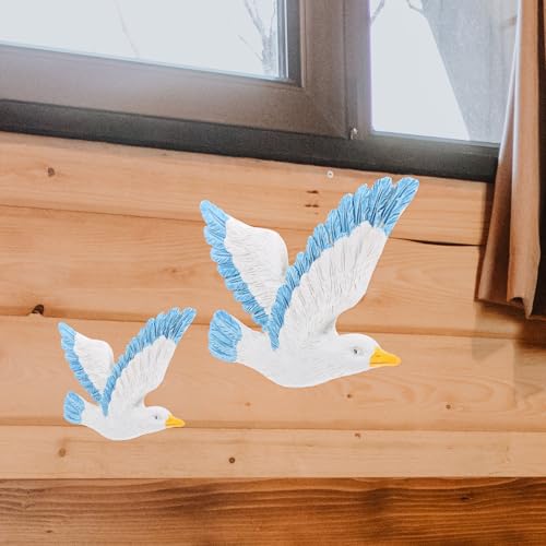 Mouettes suspendues pour embellir un mur de salon vide sans risque de chute | Résine