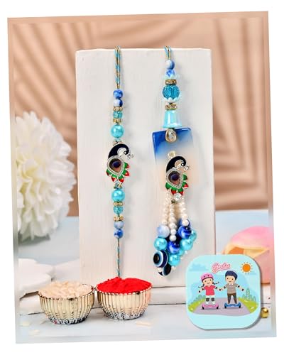 Image of CraftVatika Evil Eye Peacock Rakhi Set for Brother and Bhabhi, Designer Rakhi set for Bhaiya Bhabhi Bro Sister, Lumba for Bhabhi, with Fridge Magnet Gift, Best wishes Greeting Card, Tilak