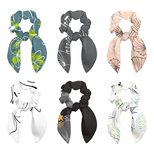 Chouchous avec nœud papillon fini les cheveux cassés avec ce motif floral gris