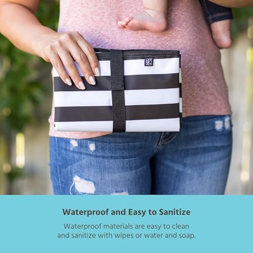 Image of J.L. Childress Full Body Portable Changing Pad for Babies, Black Stripe | X-large 30 inchx19 inch padded & portable diaper changing mat is water-resistant, wipeable & folds compact to fit in baby diaper bag