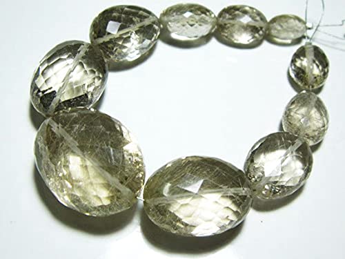 Quartz rutile doré briolettes de 223 carats pour sublimer une robe de soirée