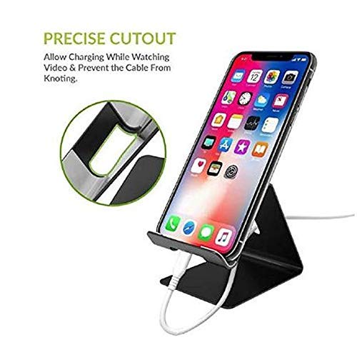 Mobile phone on stand with charging cable
