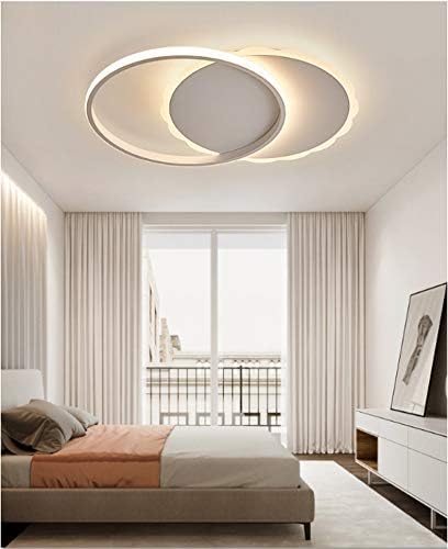 LITFAD Dimmable Modern LED Ceiling Light installed in a bedroom with a large window