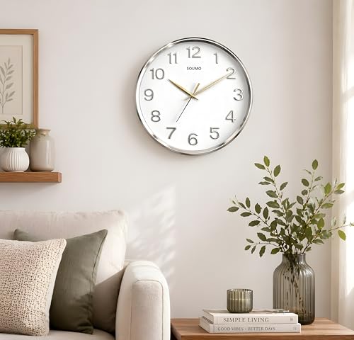 Image of Amazon Brand - Solimo 12 Inches Silent Wall Clock for Living Room Bedroom Office Plastic Easy to Read 3D Numbers Modern Stylish Sweep Movement Wall Clock for Home 1603DX (Silver)