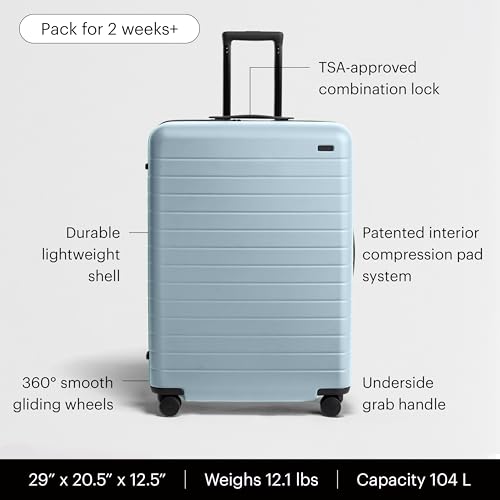 Image of Away Amazon Exclusive Large Checked Luggage - 29-Inch Lightweight Hardside Suitcase with Four WhisperGlide 360 Spinner Wheels, Interior Compression System, TSA-Accepted Lock - Sky Blue