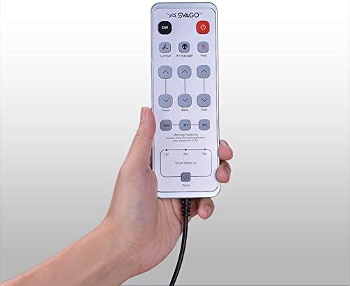 Hand holding the Svago ZGR Newton recliner remote control.
