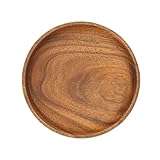 Artisanat exquis : avec ses lignes douces et ses bords arrondis, cette assiette en noyer met en valeur un savoir-faire exquis, ajoutant une touche d'élégance à votre table à manger