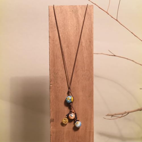 Image of AAKRITI ART CREATIONS Handcrafted Tribal & Boho Ethnic Necklace Collection | Floral, Mandala, Tassel & Dhokra Pendant Designs | Artisan Brass, Wood & Statement Jewelry for Women