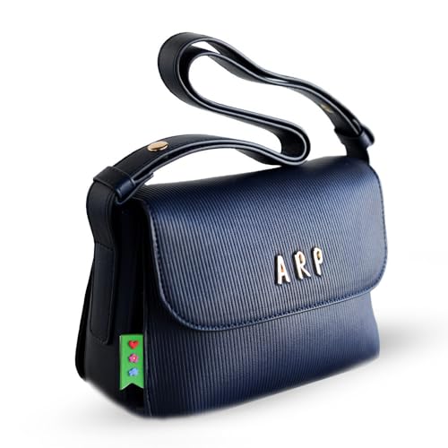 Imagen de Agatha Ruiz de la Prada Bolso Bandolera en color azul de piel vegana grabada con líneas verticales