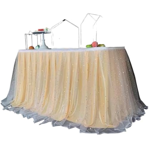 Jupes de table en tulle dorées pour sublimer un buffet de mariage