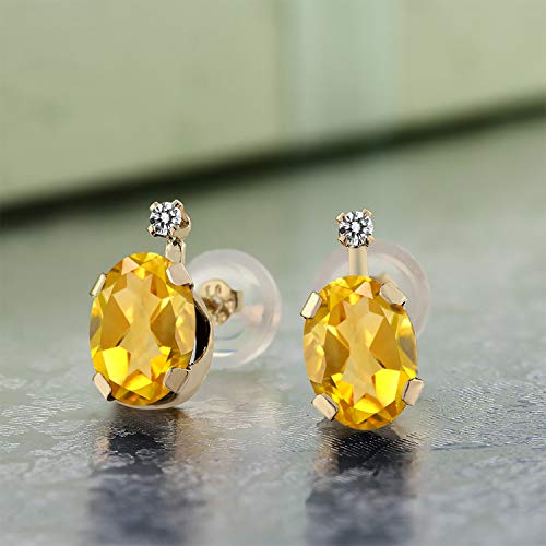 Gem Stone King 14K Yellow Gold Yellow Citrine and White Diamond Earrings For Women (1.21 Cttw, Gemstone November Birthstone, Oval 7X5MM)2