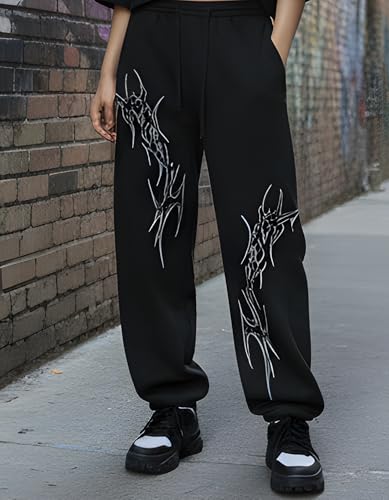 Image of Aesthetic Gothic Wide Leg Pants for Men | Tribal Print Baggy Streetwear | Oversized Track Pants with Elastic Waist | Black and White Relaxed Fit Bottoms