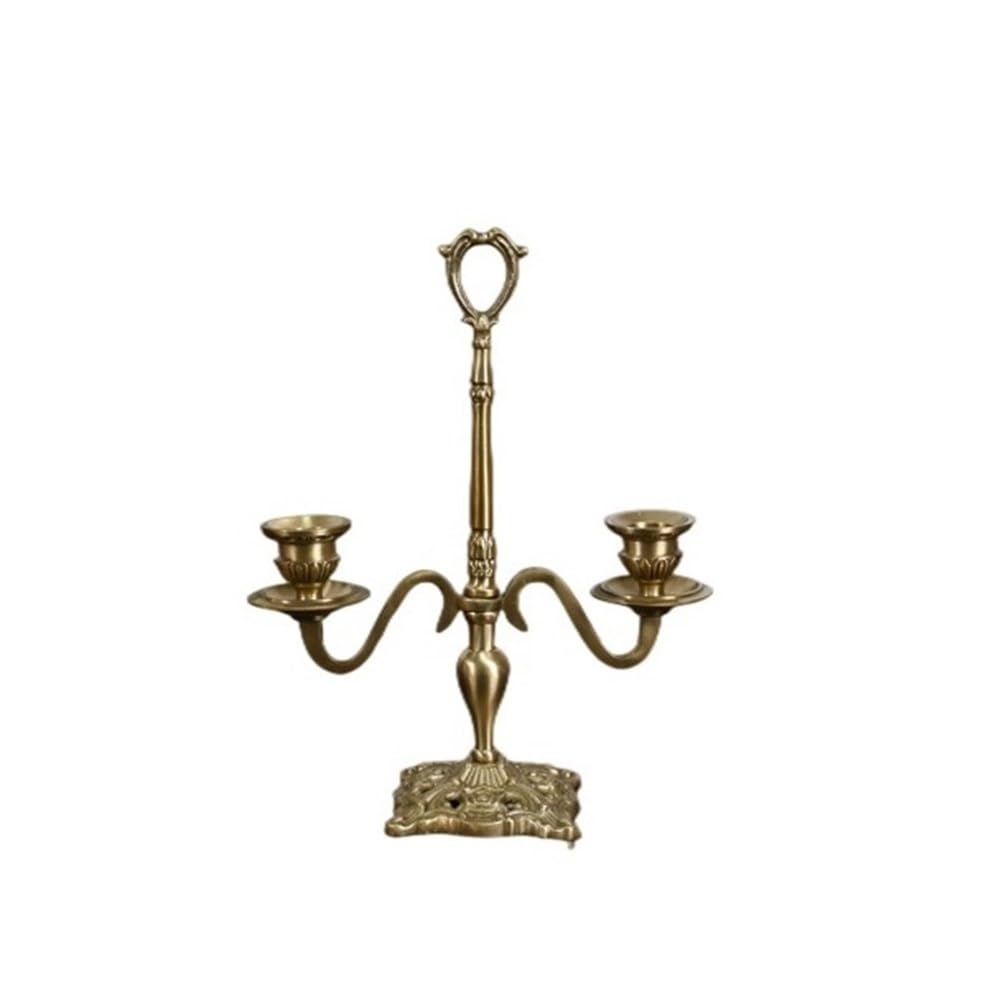 Bougeoir laiton deux têtes pour illuminer une table de salon sombre avec style