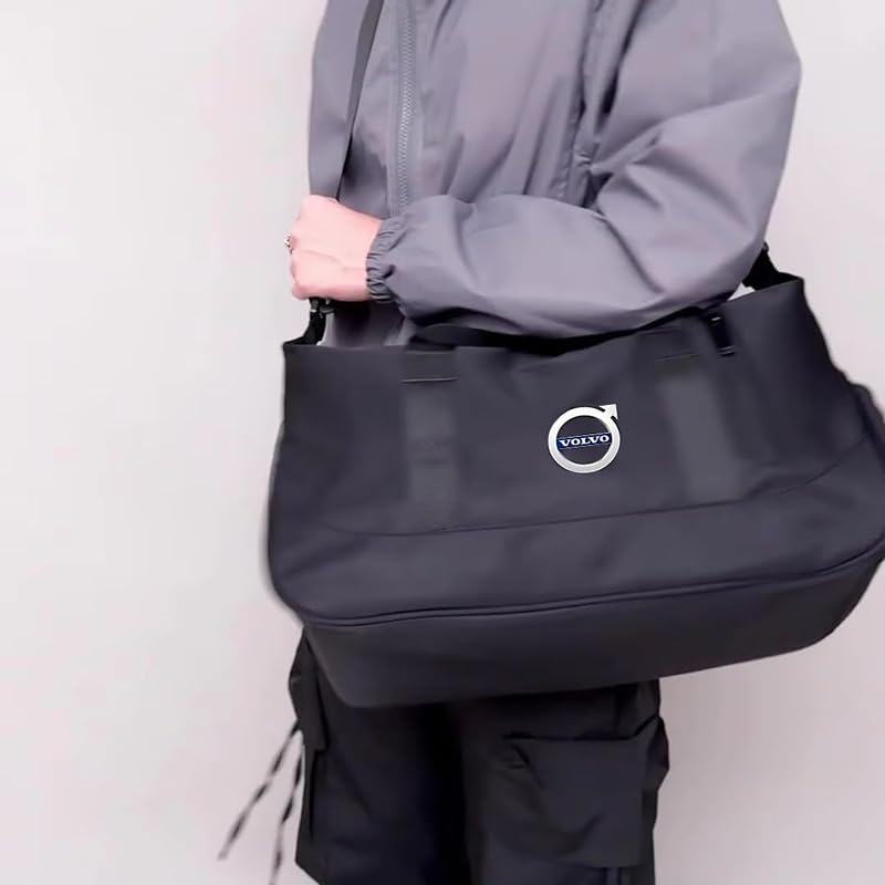 Person carrying the duffel bag by hand