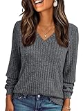 Le pull T-shirt à manches longues et col en V présente une coupe ample confortable
