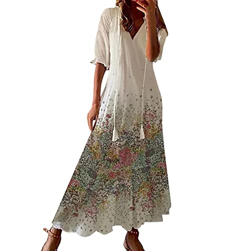 Robe d'été longue avec pompons style bohème chic en coton-lin fluide