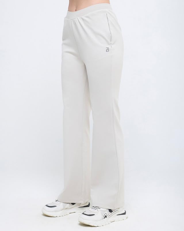 Image of HUNNIT Essential Flare Pants for Women with Zip Pockets | Mid Waist Solid Cotton Tapered Flare Pants | Bootcut Flared Trousers with Wide Elastic Waistband | Relaxed Fit Flared Trouser