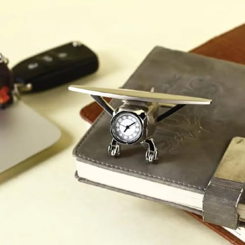 Image of Giftana Aeroplane Miniature Analog Table Clock for Students, Airplane Miniature Desk Clock Paper Weight for Doctors Table, Manual Adjustment, Easy Battery Replacement|93x40 Mm (Silver)