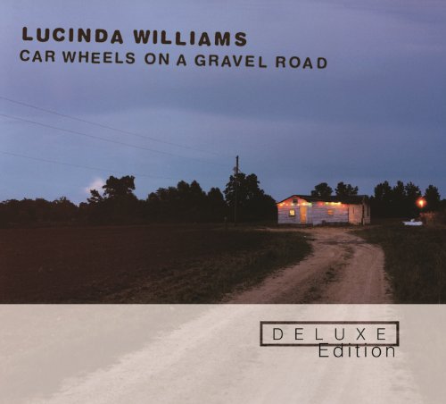 Car Wheels On A Gravel Road
