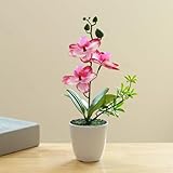 Durabilité garantie : cet arrangement floral artificiel est fabriqué à partir de matériaux synthétiques et est conçu pour durer longtemps et conserver sa beauté au fil du temps sans se faner.