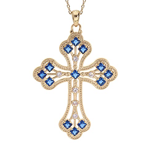 Collier en plaqué or et pendentif croix serti d'oxydes bleu foncé