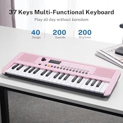 POGOLAB Piano Numérique 37 Touches, Mini Clavier Piano avec 40 Chansons, 200 Sons, 200 Rythmes, Midi, Keyboard Piano Électrique Portable pour Enfant Débutant(19,3 x 7,3 x 1,9 pouces) (Rose) - Les Beatles, Paul McCartney, John Lennon, RIngo Starr, George Harrison POGOLAB Piano Numérique 37 Touches, Mini Clavier Piano avec 40 Chansons, 200 Sons, 200 Rythmes, Midi, Keyboard Piano Électrique Portable pour Enfant Débutant(19,3 x 7,3 x 1,9 pouces) (Rose) – Image 2