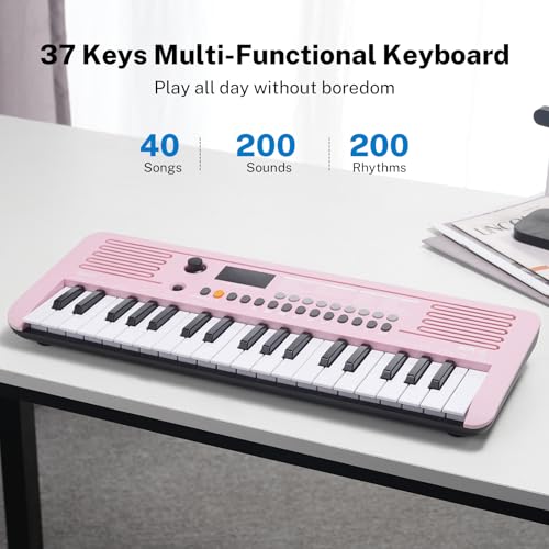 POGOLAB Piano Numérique 37 Touches, Mini Clavier Piano avec 40 Chansons, 200 Sons, 200 Rythmes, Midi, Keyboard Piano Électrique Portable pour Enfant Débutant(19,3 x 7,3 x 1,9 pouces) (Rose) - Les Beatles, Paul McCartney, John Lennon, RIngo Starr, George Harrison POGOLAB Piano Numérique 37 Touches, Mini Clavier Piano avec 40 Chansons, 200 Sons, 200 Rythmes, Midi, Keyboard Piano Électrique Portable pour Enfant Débutant(19,3 x 7,3 x 1,9 pouces) (Rose) – Image 3