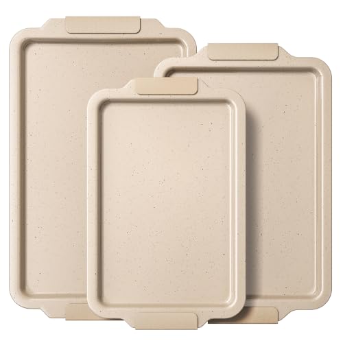 BRONYPRO almond cream ceramic-coated baking sheet with wide silicone handles — showing the grip that fits a mitt