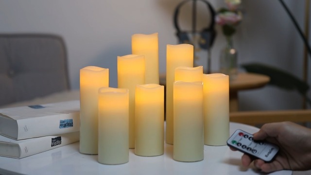 Image of Flameless Flickering Battery Operated Candles D2.2''*H4 5 inch 6 inch 7 inch 8 inch 9 inch Set of 9 Ivory Real Wax Pillar LED Candles with 10-Key Remote and Cycling 24 Hours Timer (Ivory)