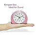 MEKO Alarm Clocks for Bedrooms, Small Battery Powered Travel Alarm Clock with Snooze and Nightlight, Silent No Ticking Bedside Clock(Pink)