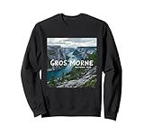 Vous cherchez une aventure ? Gros Morne Canada présente des randonneurs explorant les sentiers, ce qui le rend idéal pour les amoureux de la nature.