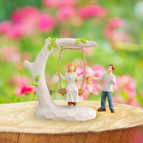 Statue de couple sur balançoire pour sublimer une table de chambre - 8